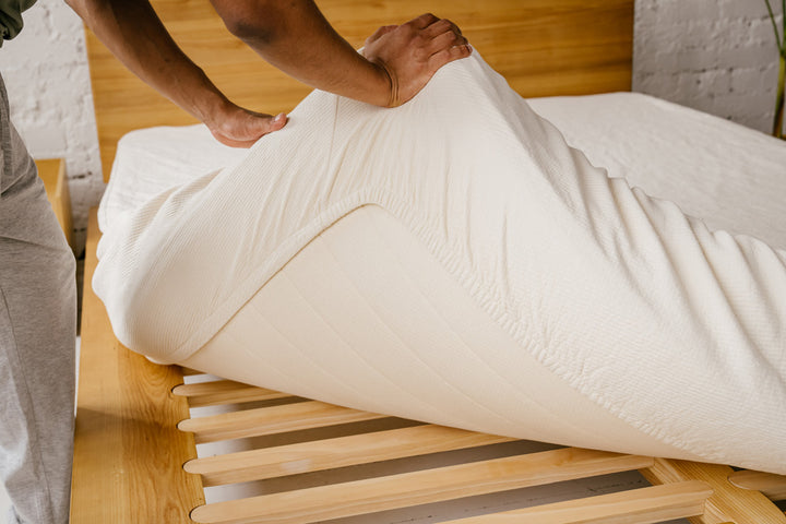 Close-up of organic cotton mattress protector's quilted texture